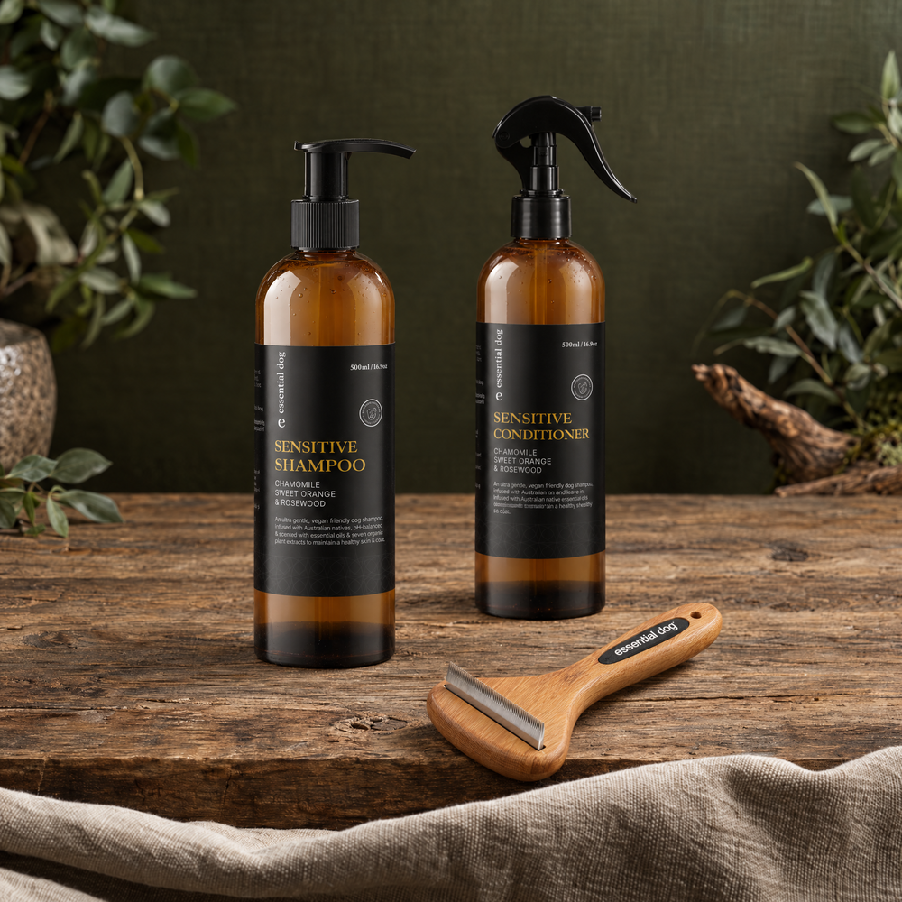 Shedding Season Dog Grooming Bundle — 500ml Sensitive Shampoo, Conditioner & Deshedding Tool in a grounded editorial tabletop scene with its included selected products.